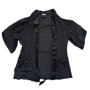 Victoria’s Secret black lace robe with bow details 
Size S
